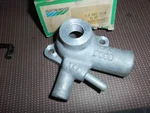 Triumph TR7 1975-1978 New Old Stock Thermostat Housing UKC6916. Fixed Price $85.00.