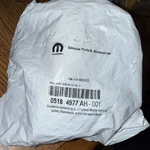 Genuine Mopar Thermostat Housing 05184977AH. Fixed Price $42.99.