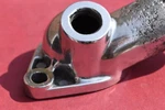 1974-1981 Thermostat Housing GM#336790 With 1/2 Npt Threaded Port....polished. Fixed Price $7.00.
