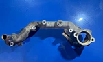 Ford Coolant Crossover & Thermostat Housing P/n: 2L1E-8C368-AA. Fixed Price $54.99.