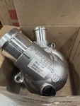 One New Genuine Engine Coolant Thermostat 079121115AT For Audi R8. Fixed Price $300.00.