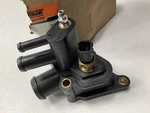 Dorman 902-302 Engine Coolant Water Outlet With Sensor. Fixed Price $22.45.