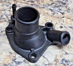 Genuine Jaguar XJ6 - Thermostat Housing Cover C30836. Fixed Price $99.95.