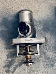 Motorad 725-221 Integrated Housing Thermostat Fits Chevrolet, Pontiac. Fixed Price $30.00.