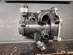 Genuine Vw Audi Water Pump And Thermostat Assembly 06L121111P & 06L121012 New. Fixed Price $250.00.