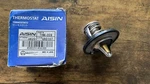 Engine Coolant Thermostat Aisin THM-009. Fixed Price $18.00.