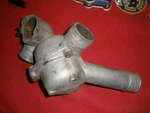 Mercedes OEM...W123 Thermostat Housing Assembly Part # 617 203 1473. Fixed Price $90.00.